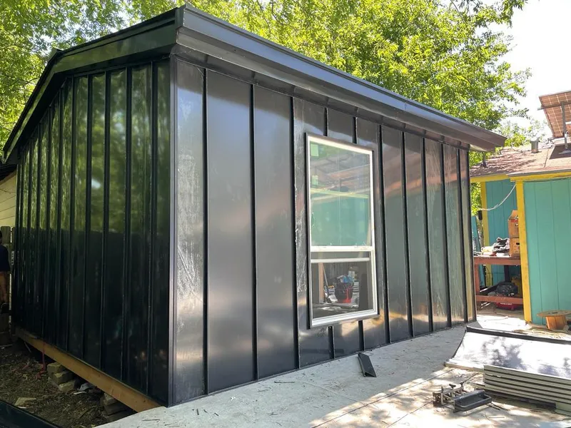 Black standing seam metal wall panels for Metal Roof Installation in Mahomet