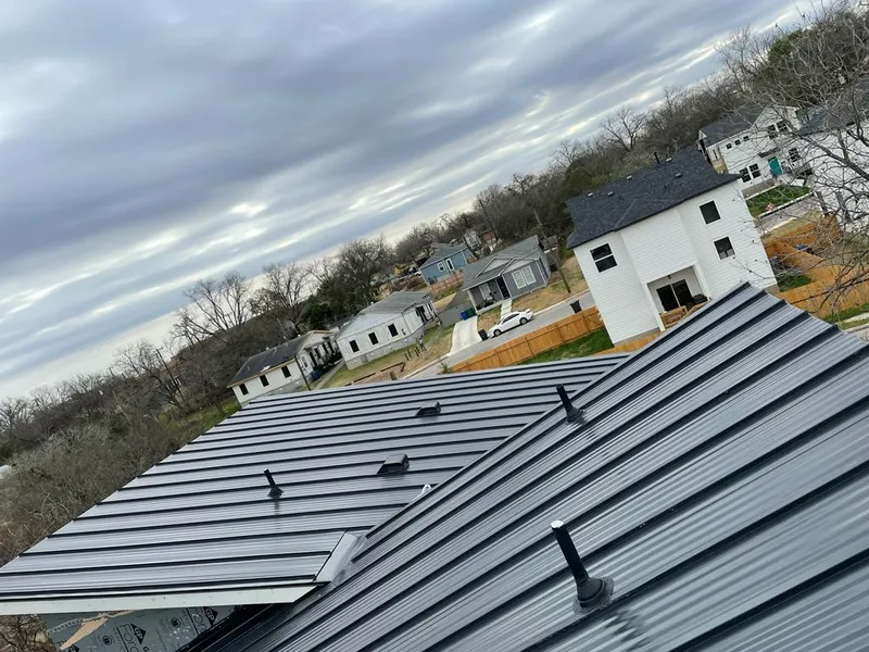 Standing seam metal roof panels with vents for Skylight Repair in Mahomet